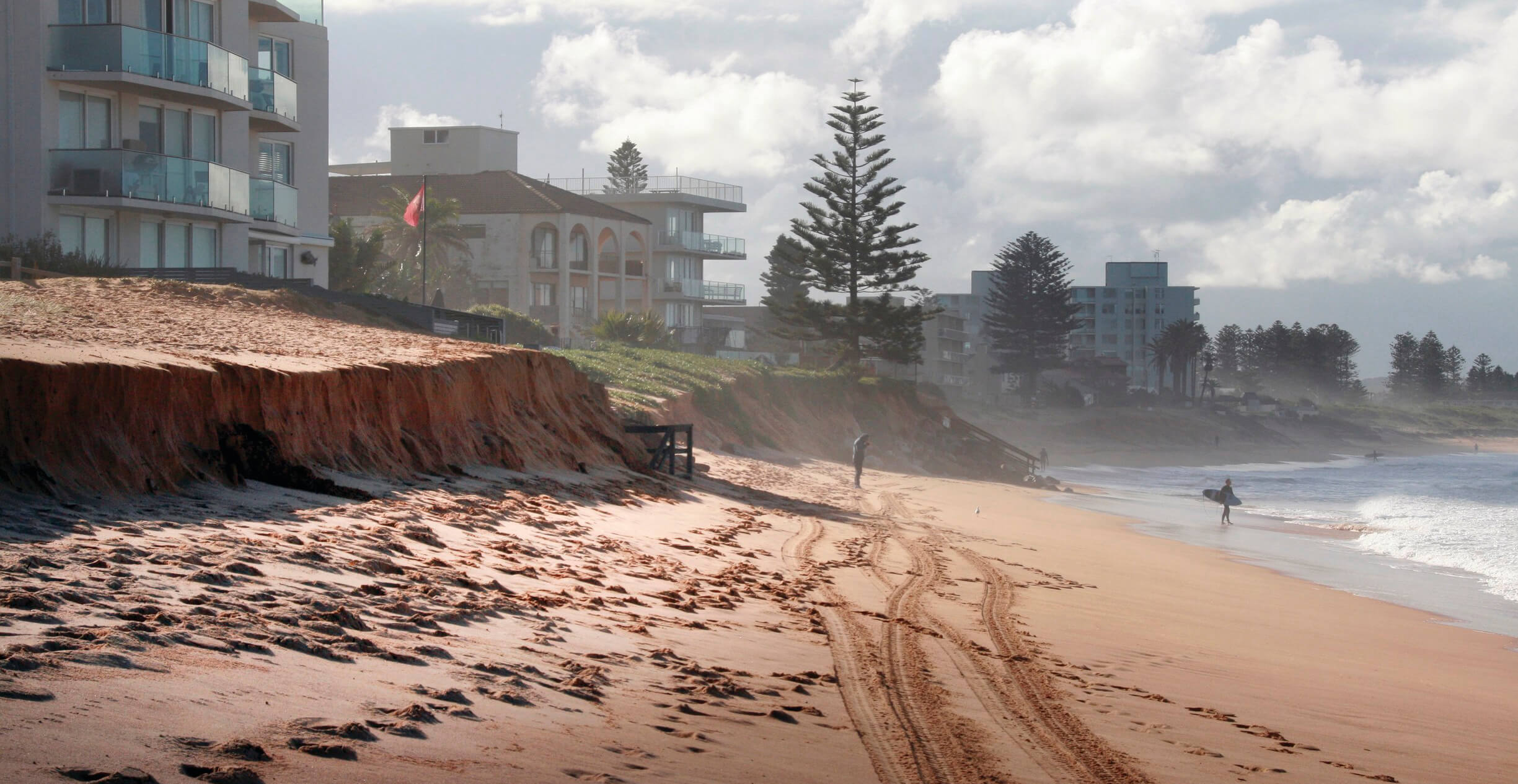 Beach erosion close to habitations in stormy weather