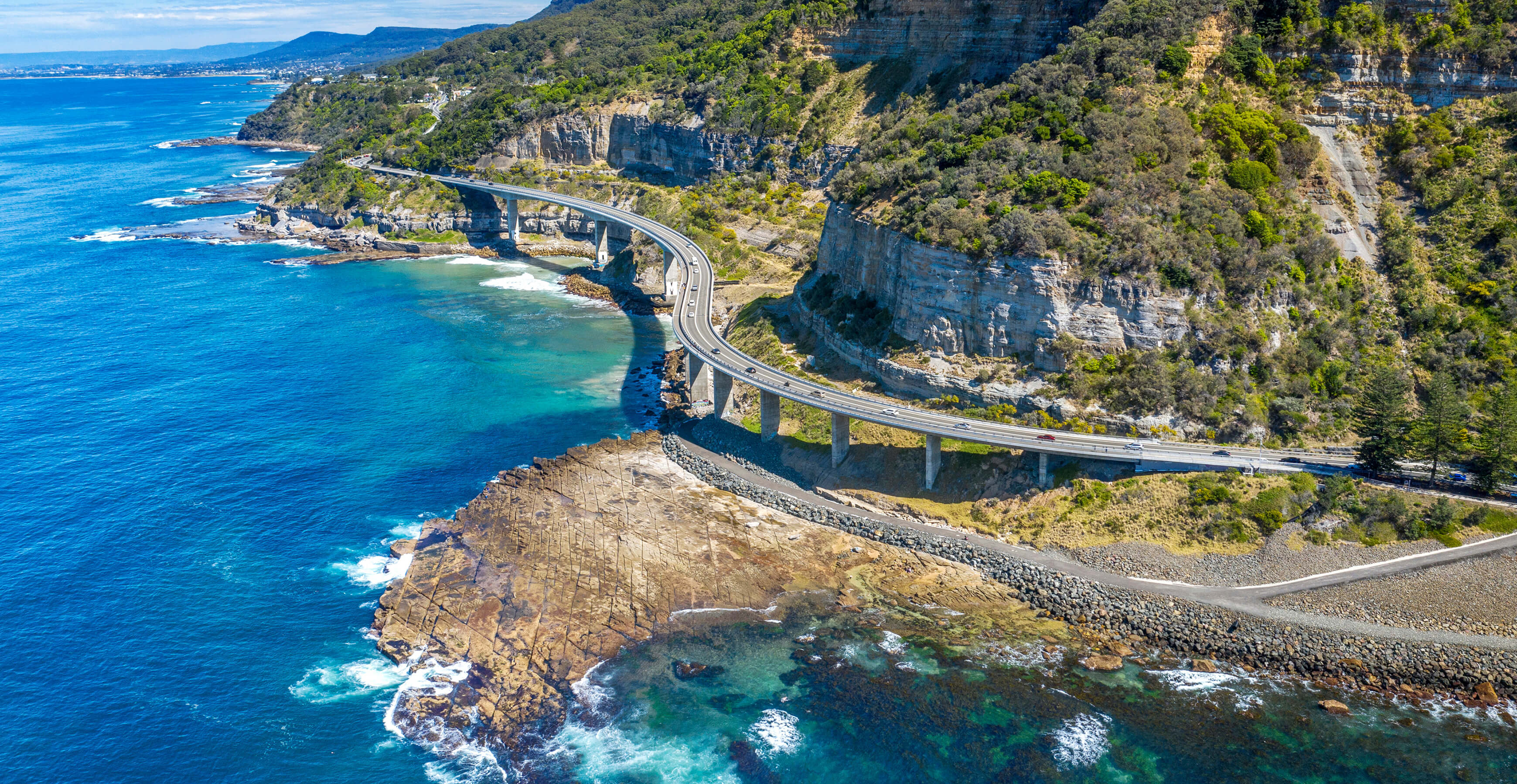 View of a curvy part of a scenic sea cliff bridge