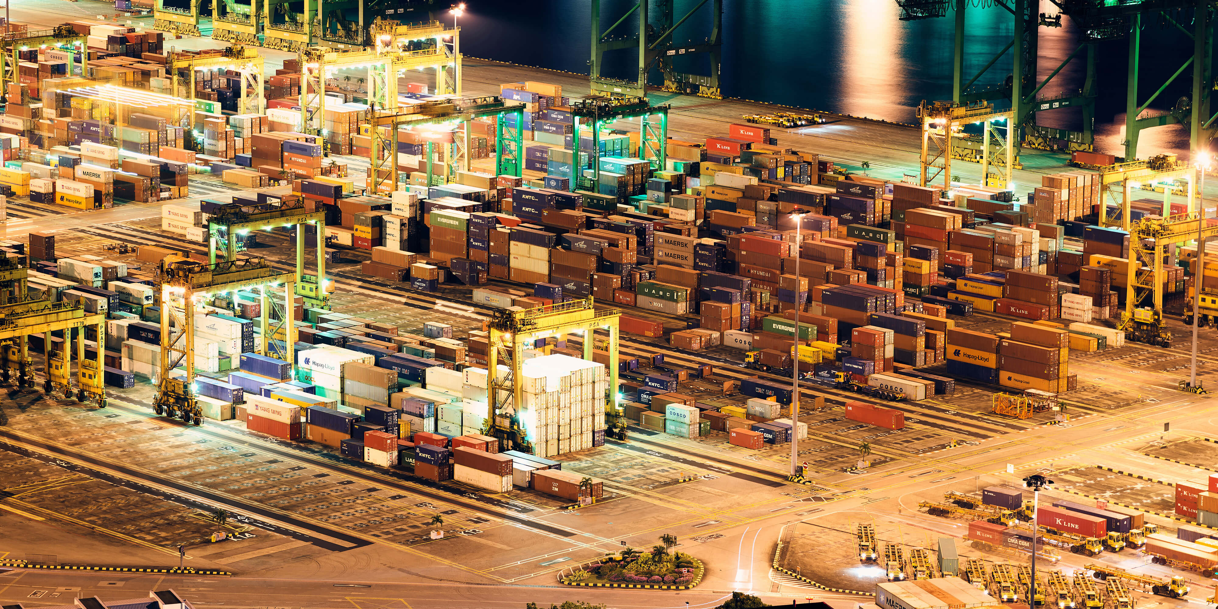 Nigh time view of shipping containers at a port