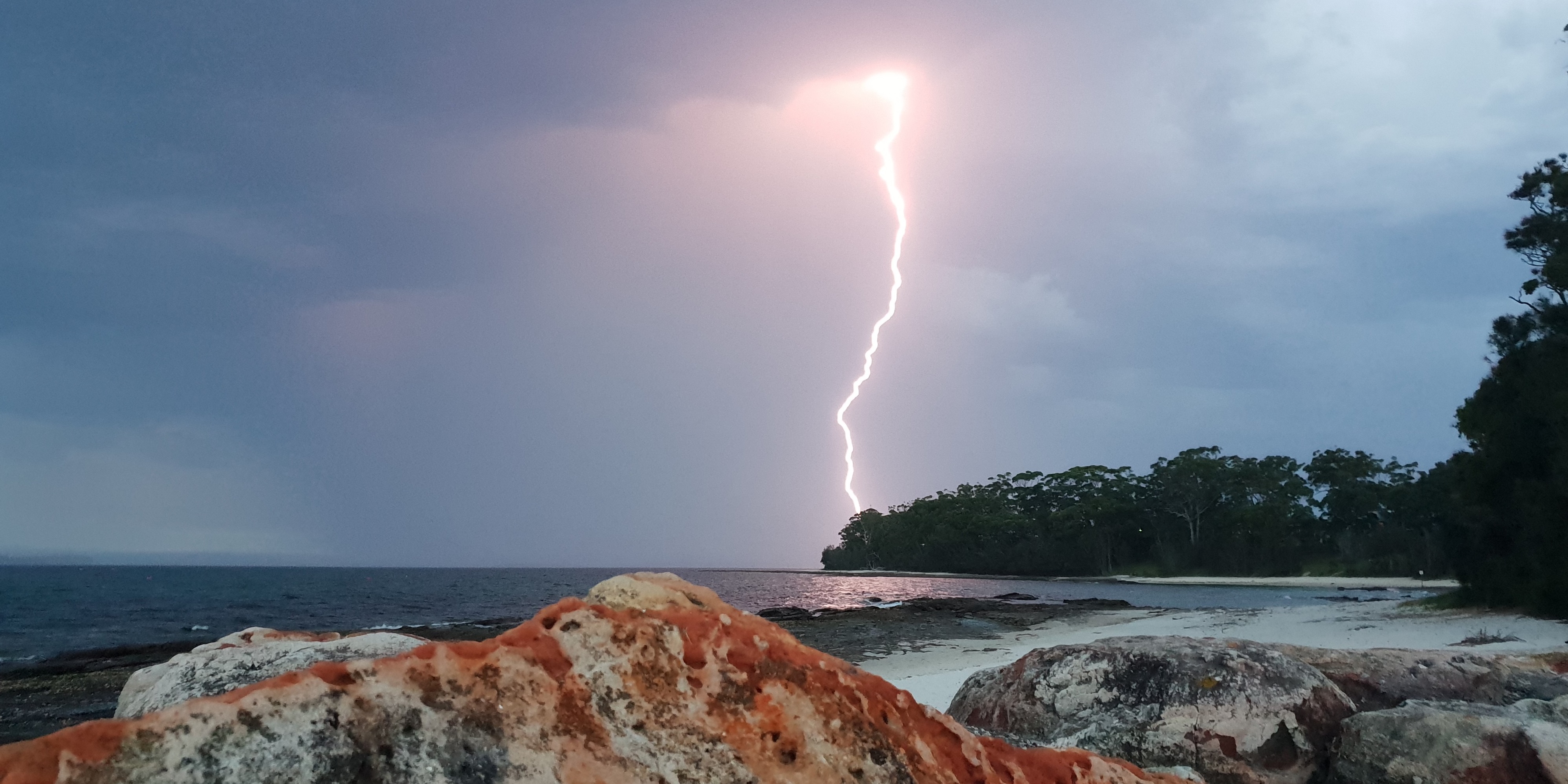 Lighting strike over coast