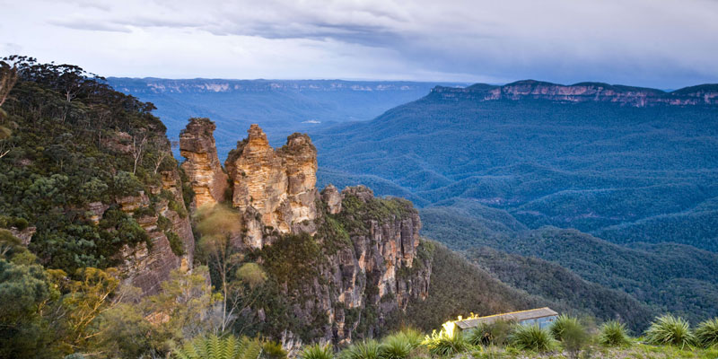 Three rocky outcrops surrounded by bushland