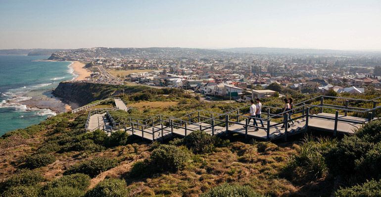 People enjoying the scenic walk along the Newcastle Memorial Walk