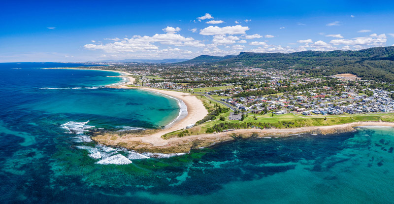 Aerial scenic coastline showing Sandon Point in Bulli in NSW