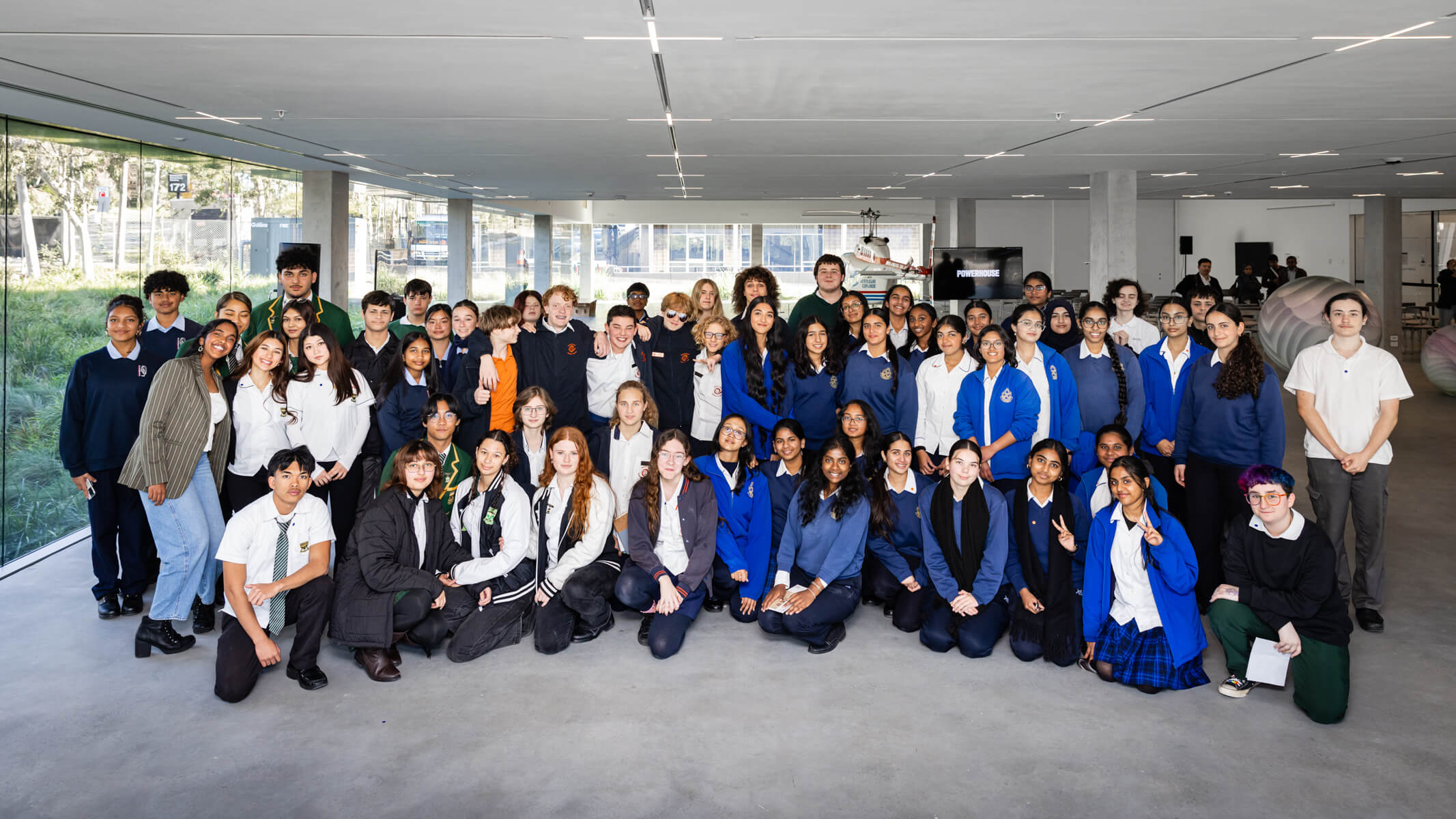 A group photo of smiling students at the Future Leaders Forum 2025.