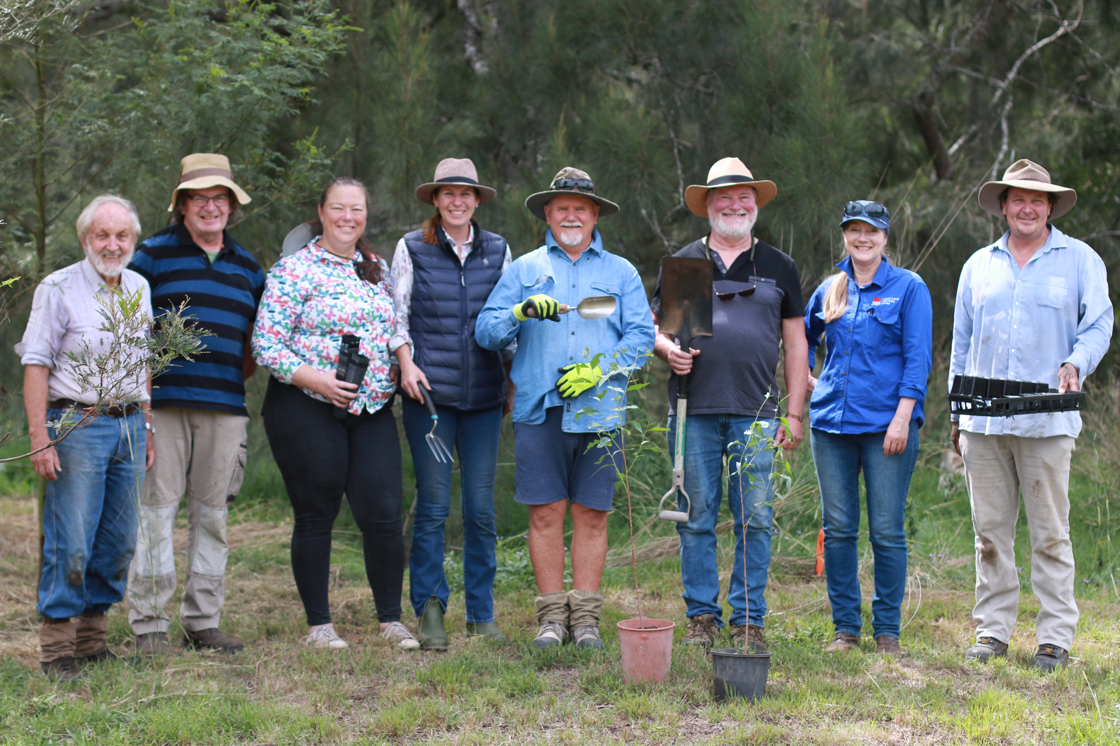 Broke Bulga Landcare members standing in a line for Euc camaldulensis restoration project