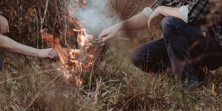 Grass fire being lit