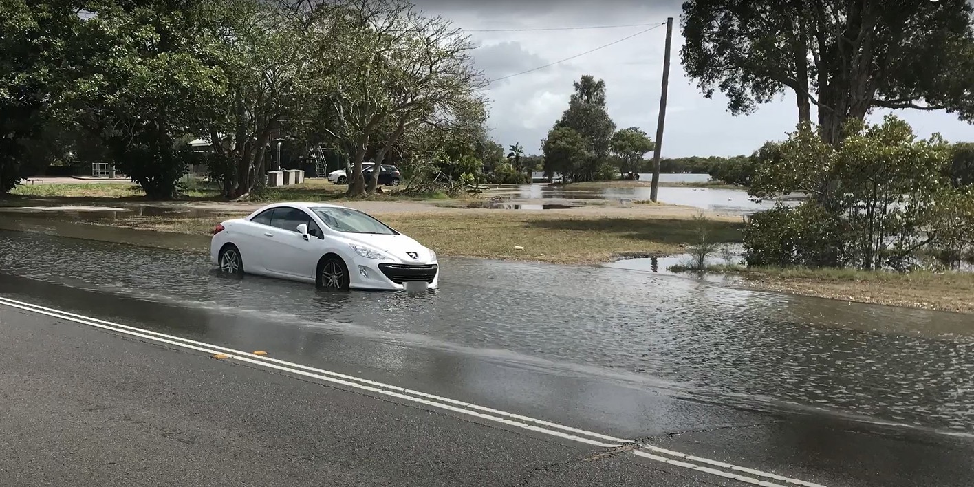 Car in water, Tidal inundation at Swansea, Bowman Street